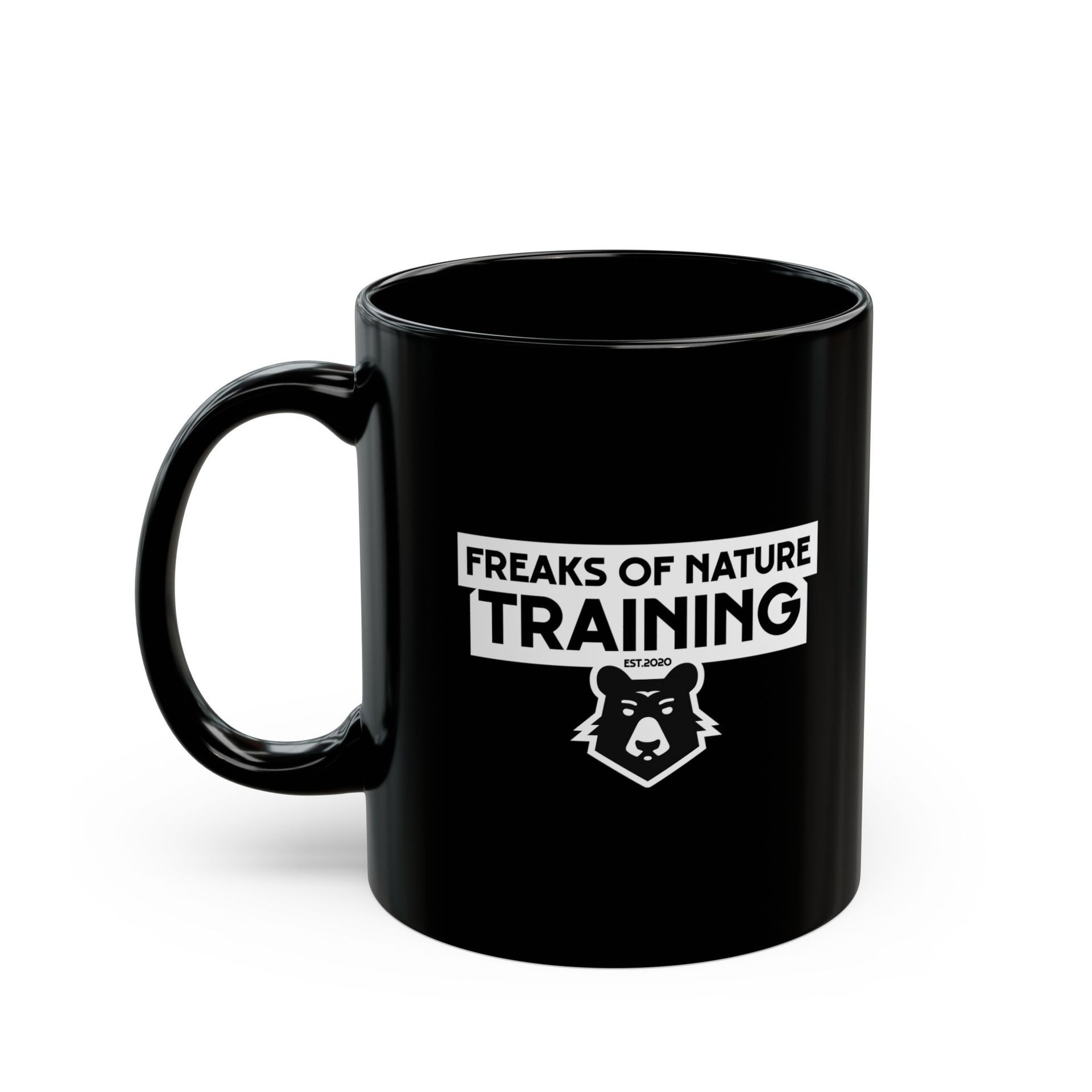 Black mug with 'Freaks of Nature Training' and bear logo printed in white.